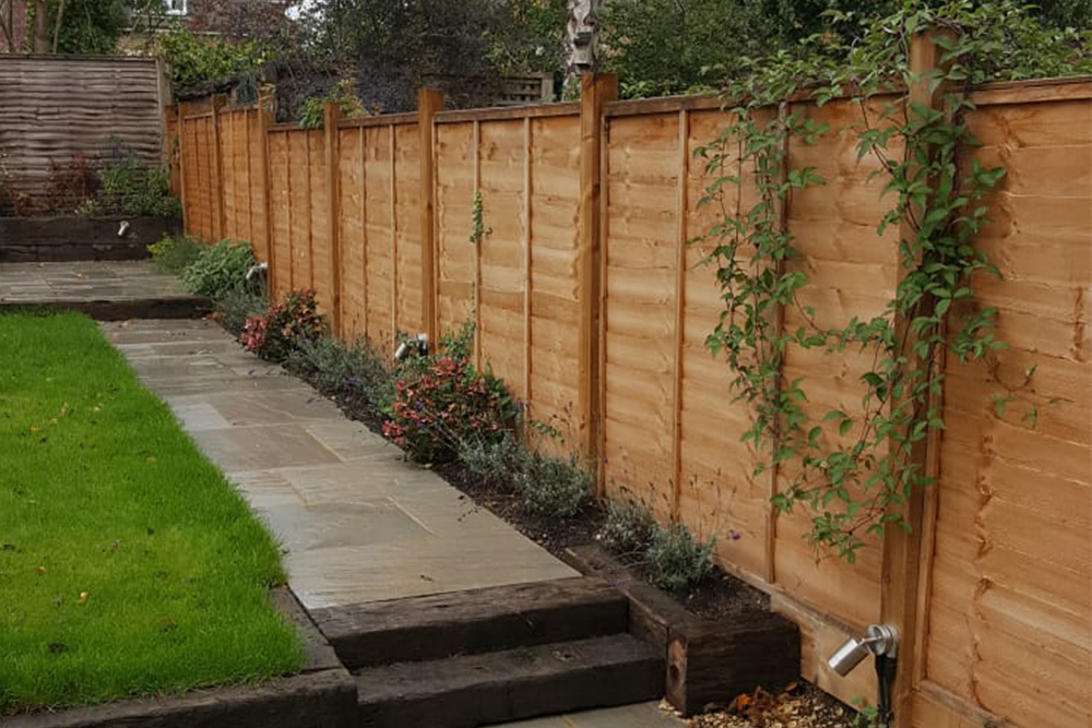 Stepped Timber Panel Fencing w/ Posts