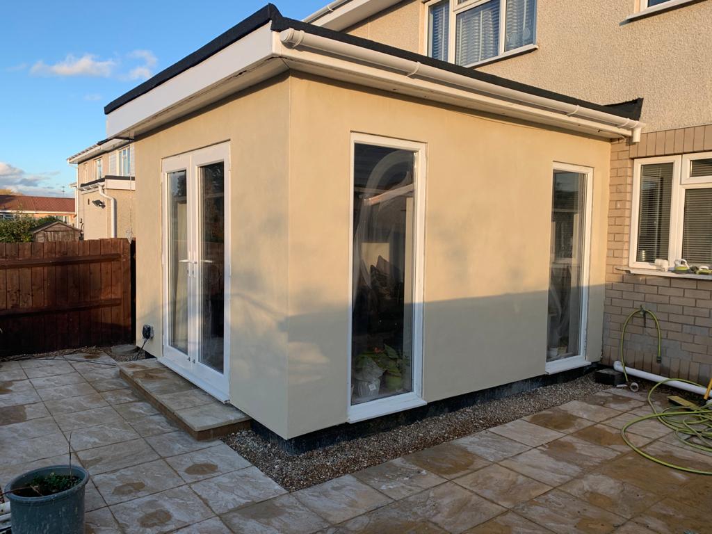 Rendered Timber Frame Extension with patio and ballast surround