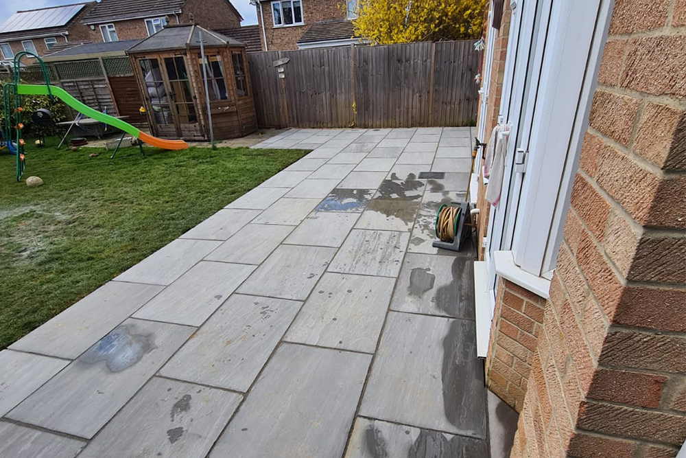 Patio and Paving w/ soft landscaping around garden edge